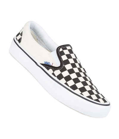 white checkerboard vans slip on