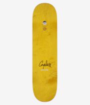 Fucking Awesome Caples Embossed Photo Shape #2 8.25" Skateboard Deck, full bottom view: yellow wood-grain deck with centered black 'Caples' script, small white 'Fucking Awesome' text below and round 'Warning' sticker. Clean Studio image; white background