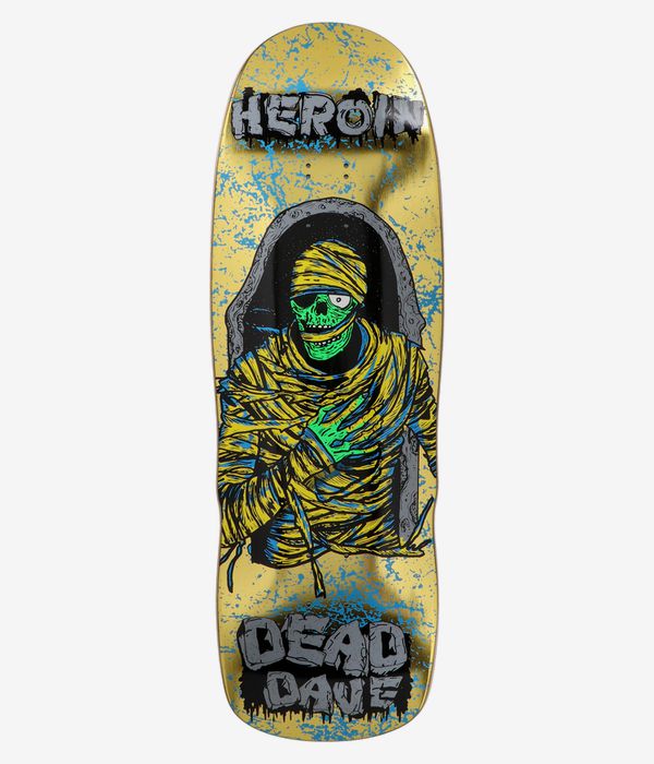 Heroin Skateboards Dead Dave KO2 Mummy 10.125" Skateboard Deck, full bottom view: metallic gold background with blue splatter, central neon green skull wrapped in yellow bandages inside a black coffin-shaped arch, 'HEROIN' upper and 'DEAD DAVE' lower text; clean studio image; white background.