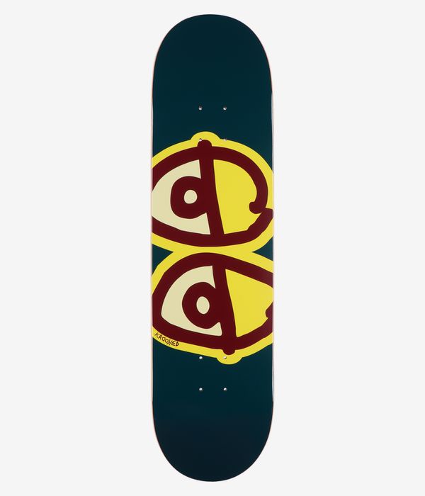 Planche de skateboard Krooked Team Eyes 8,25 pouces, vue de dessous complète — planche vert foncé ornée de deux yeux jaunes de style cartoon superposés, soulignés de formes intérieures bordeaux et crème ; petit logo « Krooked » visible. Image studio nette ; fond blanc