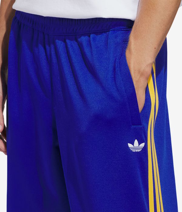 adidas Superfire Track Pantaloni (team royal blue preloved yellow)