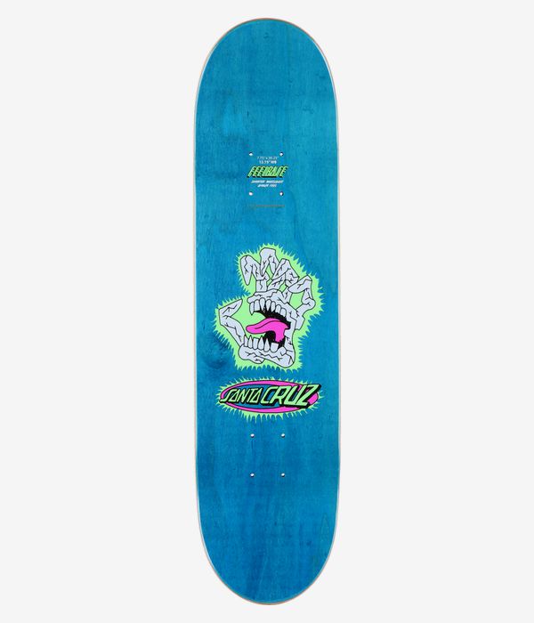 Santa Cruz Scribble Head FeelBase 7,75"-Skateboard-Deck, Ansicht von oben – ein durchgehend blau gebeiztes Deck mit einer in der Mitte abgebildeten Cartoon-Figur einer abgetrennten Hand, die zu einem schreienden Mund geformt ist (weiße Zähne, rosa Zunge), darunter das ovale Santa Cruz-Logo mit neongrünen und rosa Konturen. Klares Studiobild; weißer Hintergrund.