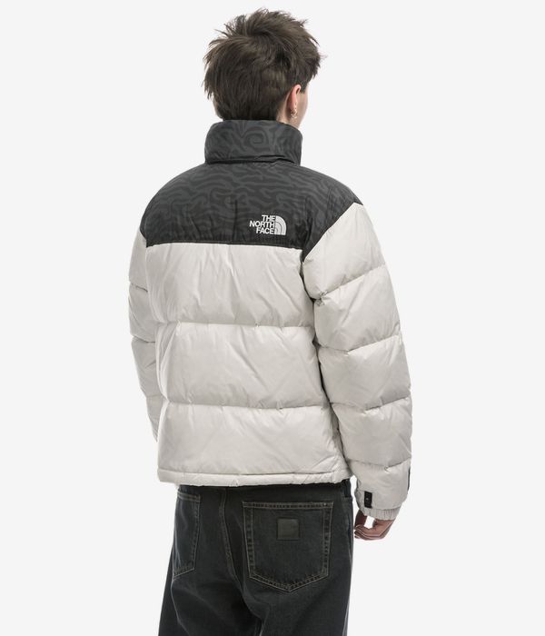 Shop The North Face 1996 Retro Nuptse Jacket white dune tnf black online skatedeluxe
