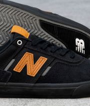 New Balance Numeric 306 Schuh (black orange black)