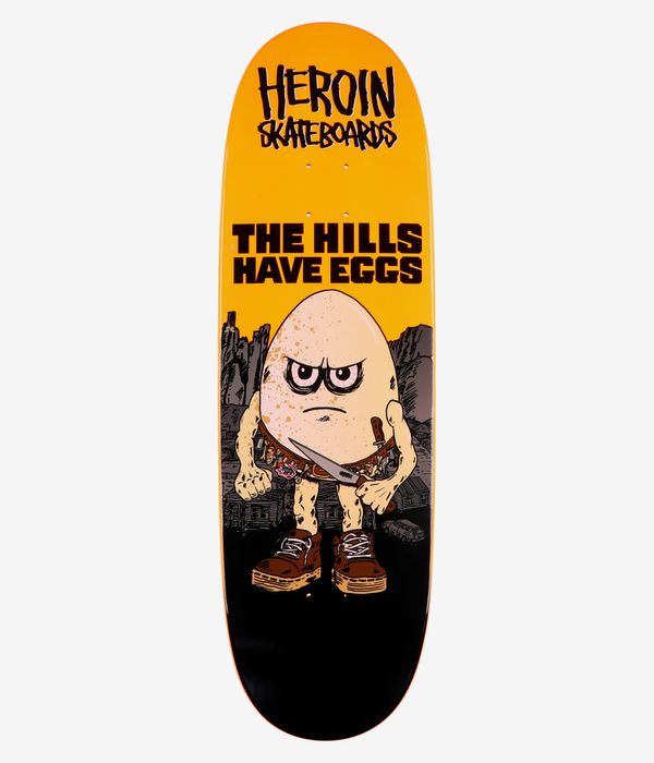 Heroin Skateboards Hills Have Eggs 9.5" Skateboard Deck full bottom view, bright yellow background with large cartoon egg character holding a knife, black building silhouettes, bold text 'The Hills Have Eggs'; clean studio image; white background