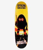 Heroin Skateboards Basalt On Precint 13 Egg 8.75" Skateboard Deck, full bottom view: yellow wood-toned deck with bold black egg-shaped cartoon character with red-orange eyes, skyline silhouette and white “Basalt On Precinct 13” text. Clean Studio image; white background.