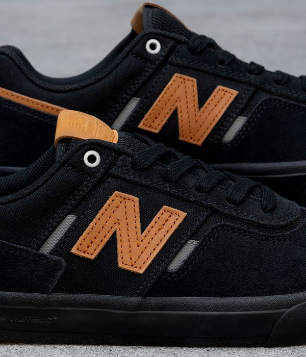 New Balance Numeric 306 Schuh (black orange black)
