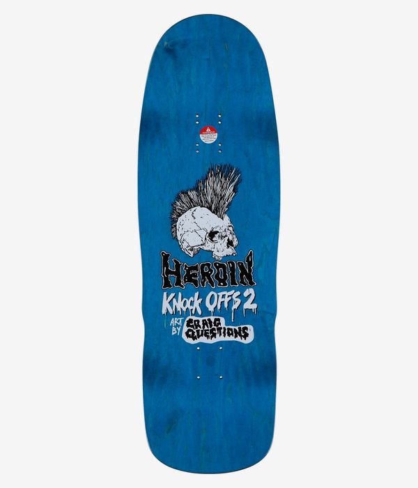 Heroin Skateboards Dead Dave KO2 Mummy 10.125" Skateboard Deck, full top view: solid bright blue wood-stain deck with large central black-and-white skull graphic, stacked 'Heroin' and 'Knock Offs 2' text and small credit; clean studio image; white background