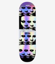 Tavola da skateboard Opera Woolley Repeater da 9", vista completa del fondo: parte inferiore della tavola nera con sfondo arcobaleno multicolore iridescente, volti stilizzati neri ripetuti, fascia centrale bianca con testo scritto a mano e logo "OPERA" in grassetto. Immagine pulita da studio; sfondo bianco