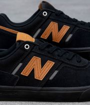 New Balance Numeric 306 Schuh (black orange black)